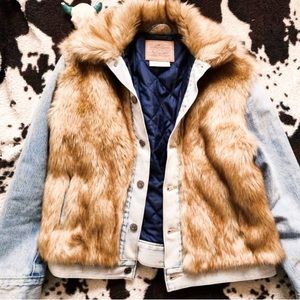 Levi’s light blue jean jacket with tan faux fur. NWT